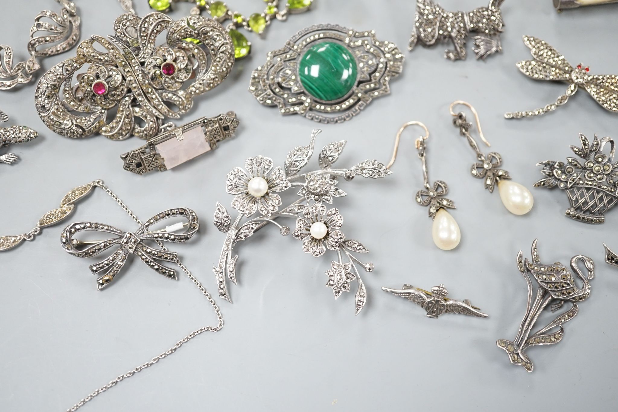 A small collection of assorted mainly white metal and marcasite set jewellery, including brooches, bracelet etc. and an enamelled RAF brooch.